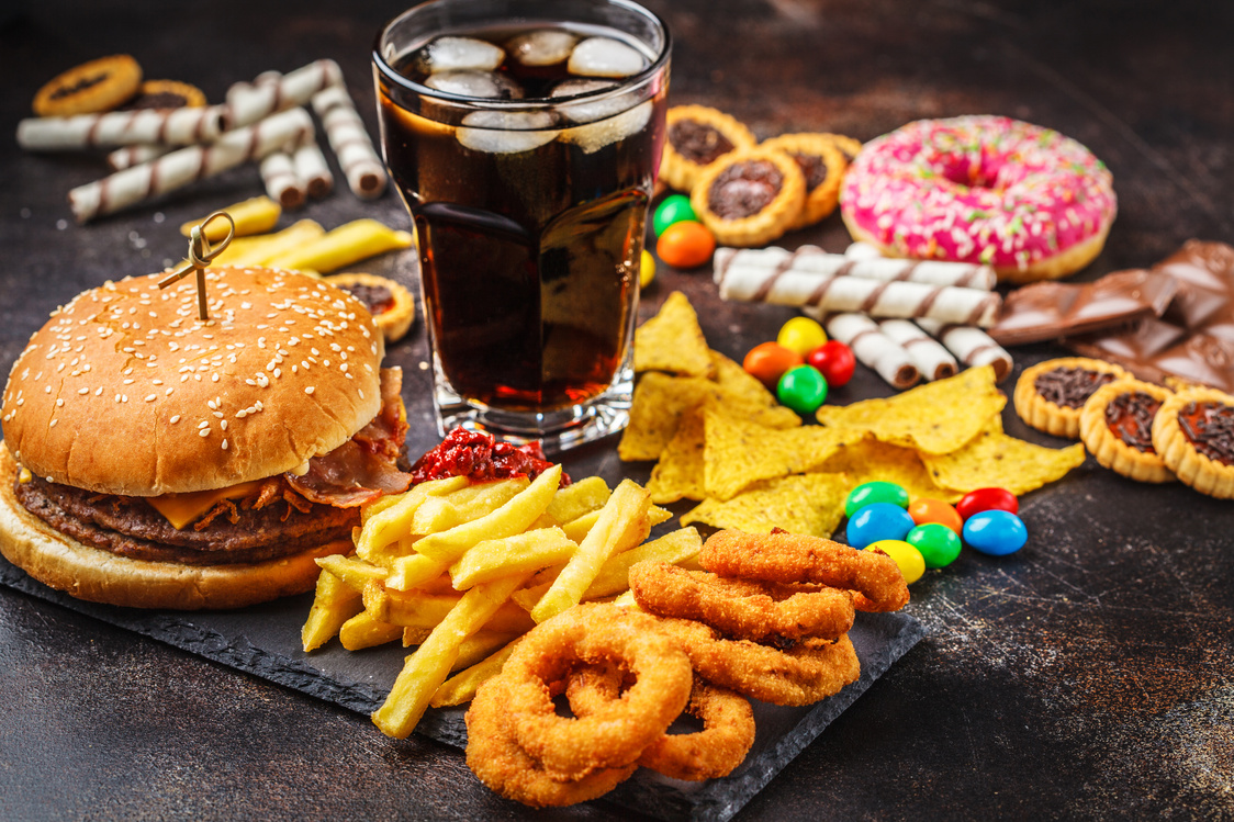 Fried Food and Desserts on a Stone Plate 